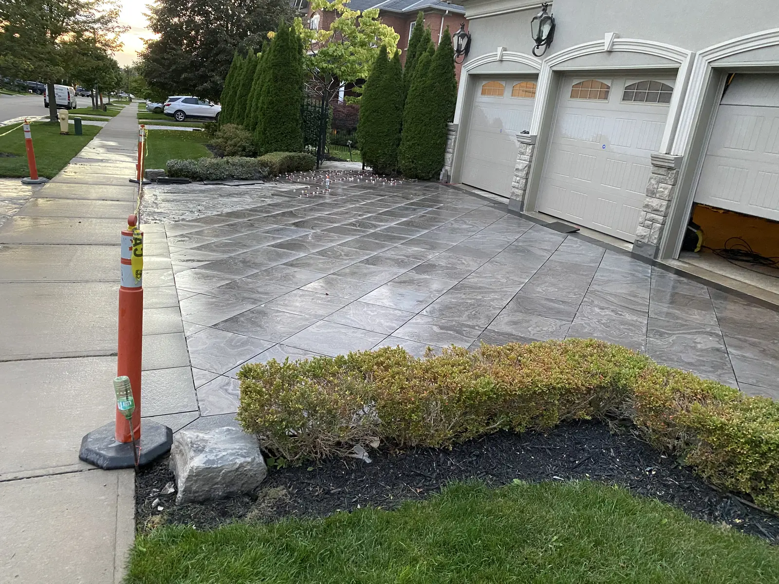 Large format porcelain paver driveway at a Whitby home