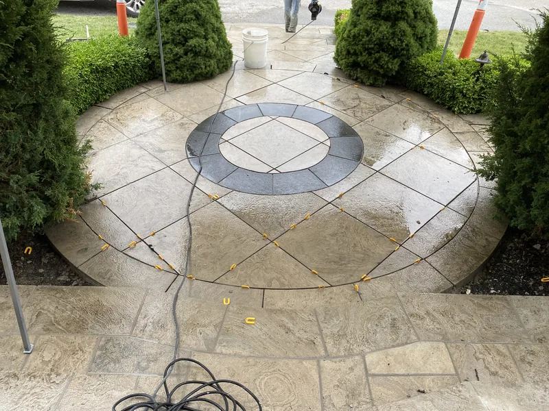Stone walkway with a circular inlay at a Whitby entrance