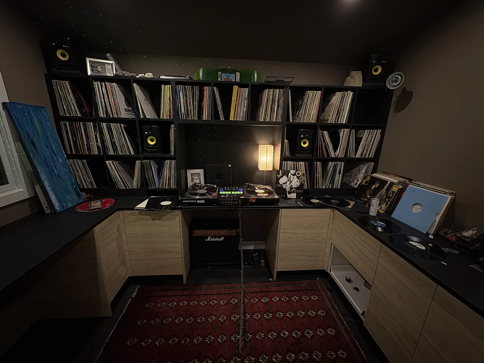 Custom built-in shelving and cabinets in a finished home studio