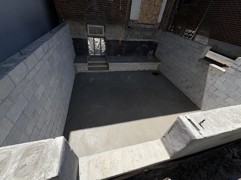Slab and handover on a Toronto rear addition foundation